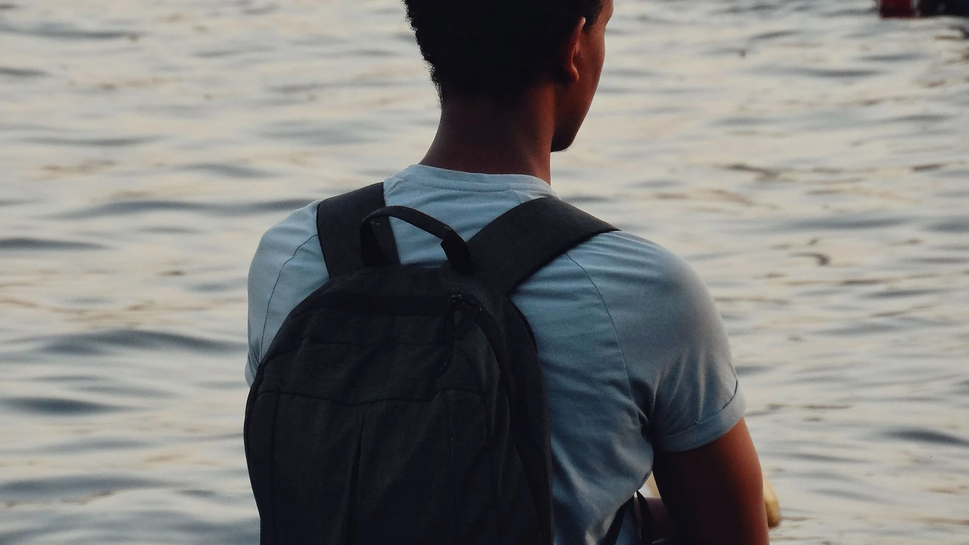 Customised packages – traveller looking out over the water